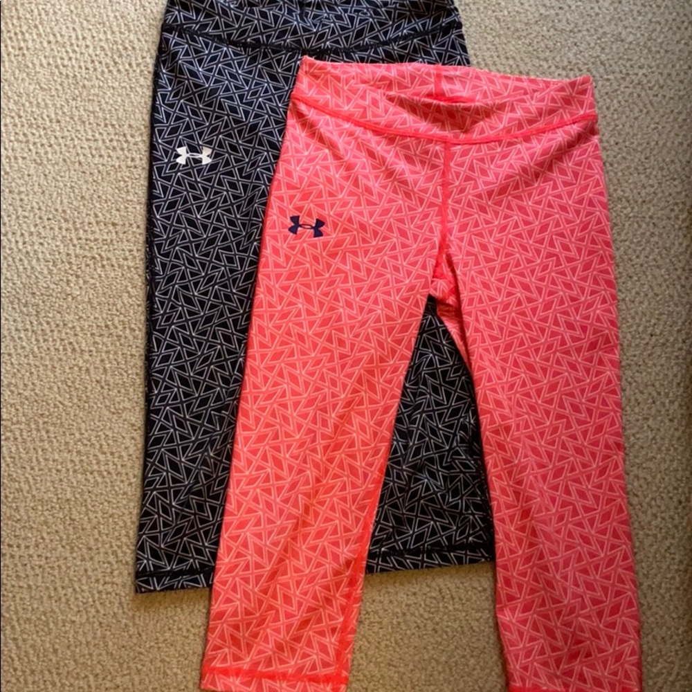 Two pairs of Under Armor capri leggings